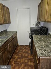 7613 Fontainebleau Dr-Unit -2106 in New Carrollton, MD - Foto de edificio - Building Photo