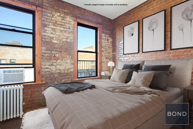 410 E 13th St in New York, NY - Building Photo - Building Photo