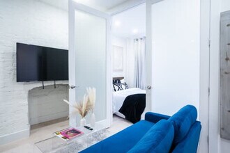 402 E 11th St in New York, NY - Building Photo - Building Photo