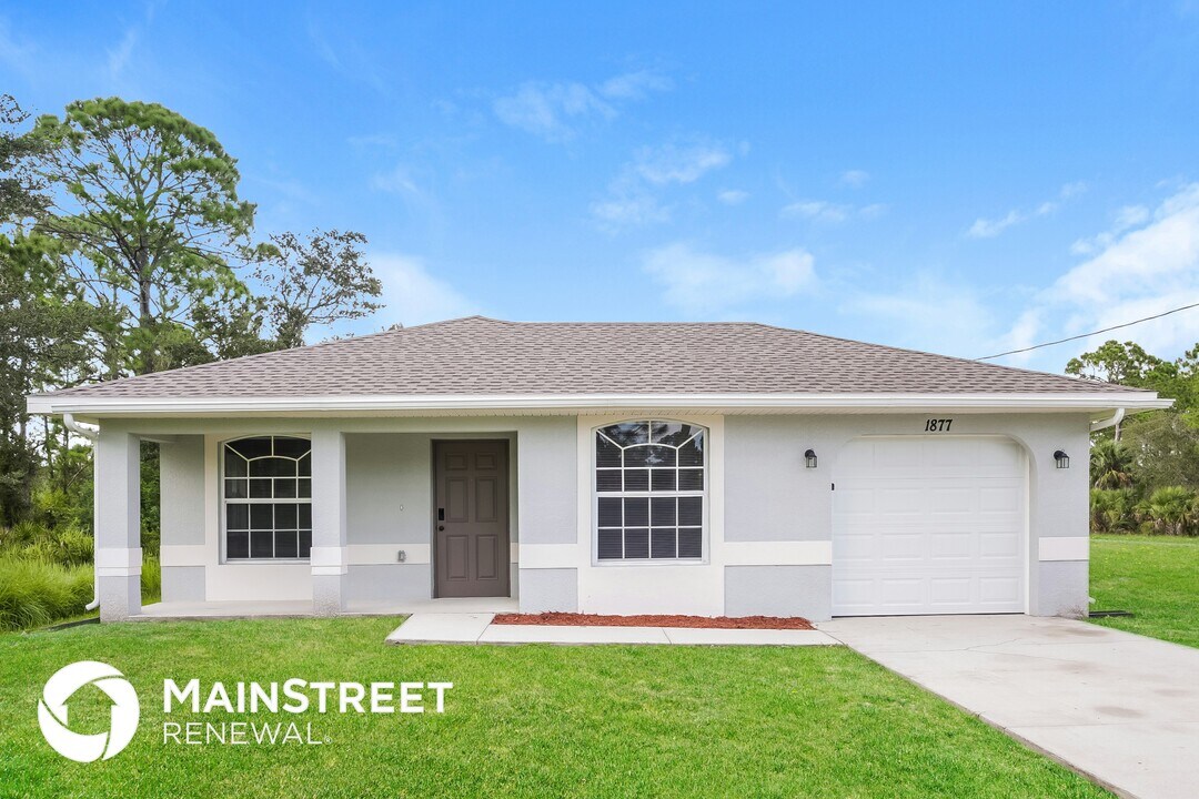 1877 Mettler Ave in Lehigh Acres, FL - Foto de edificio