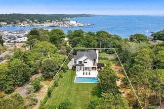 28 Canoe Place Rd in Hampton Bays, NY - Building Photo - Building Photo