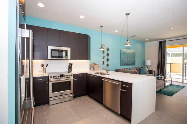 1440 Retreat Cir in Clermont, FL - Foto de edificio - Building Photo