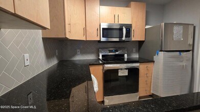 8401 N Atlantic Ave, Unit 7 in Cape Canaveral, FL - Building Photo - Building Photo