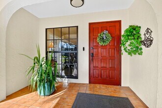 435 Pine Villa Dr in Atlantis, FL - Building Photo - Building Photo