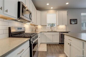 12882 E Caspian Pl in Aurora, CO - Building Photo - Building Photo