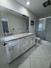 497 W Conference Dr in Boca Raton, FL - Building Photo - Building Photo
