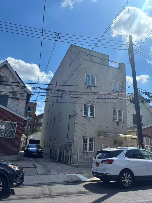 property at 41-59-59 70th St