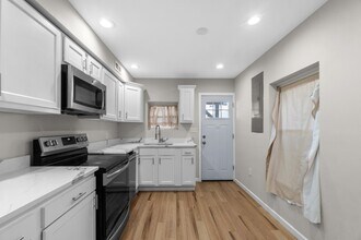 208 S Durham St in Baltimore, MD - Building Photo - Building Photo