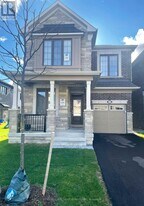 1405 Mockingbird Sq in Pickering, ON - Building Photo