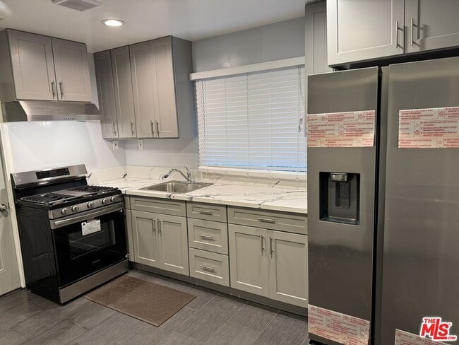 property at 15746 Magnolia Blvd