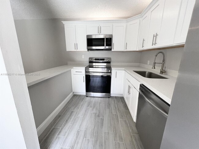 1415 14th Ct in Palm Beach Gardens, FL - Building Photo - Building Photo