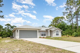 2208 Ravel Rd SE in Palm Bay, FL - Building Photo - Building Photo