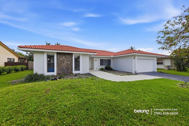 property at 9460 NW 16th St