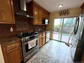 1316 Mcclure Ave in Elmont, NY - Building Photo - Building Photo