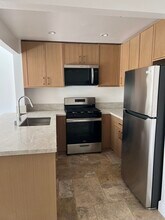 1517 Armacost Ave, Unit 102 in Los Angeles, CA - Building Photo - Building Photo