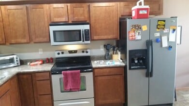 256 Woodfield Dr in Tiffin, IA - Building Photo - Building Photo