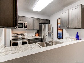 14892 E Kentucky Dr in Aurora, CO - Building Photo - Building Photo