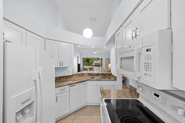 121 Wading Bird Cir in Naples, FL - Foto de edificio - Building Photo