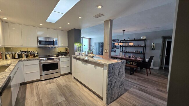 property at 5825 Collins Ave