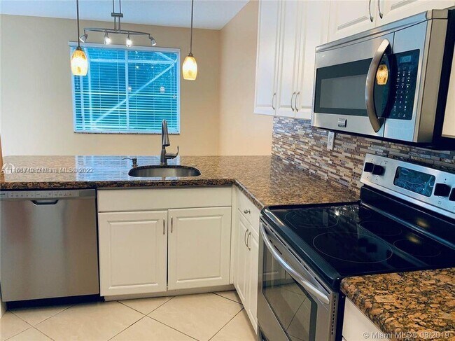 5115 Stage Coach Dr-Unit -- in Coconut Creek, FL - Building Photo - Building Photo