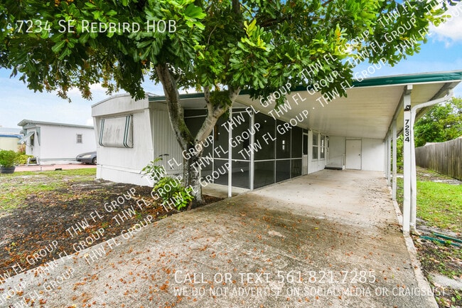 property at 7234 SE Redbird Cir