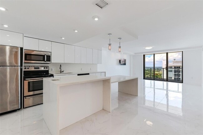 property at 5701 Collins Ave