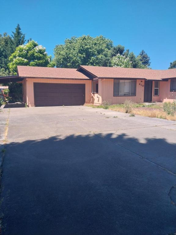 property at 410 NE Candy Ln