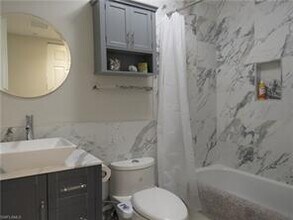 1435 Mariposa Cir-Unit -104 in Naples, FL - Building Photo - Building Photo