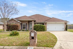 5659 Tiger Woods Dr in Milton, FL - Building Photo