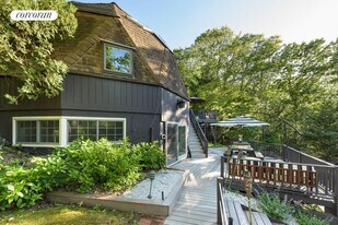 23 Tanglewood Trl in Hampton Bays, NY - Building Photo