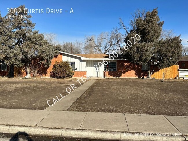 3002 Curtis Dr-Unit -A in Amarillo, TX - Foto de edificio - Building Photo