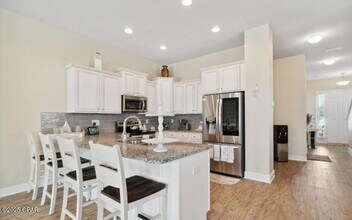 100 Barefoot Falls in Panama City Beach, FL - Building Photo - Building Photo
