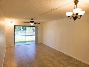 11453 NW 39th Ct, Unit 111 in Coral Springs, FL - Building Photo - Building Photo