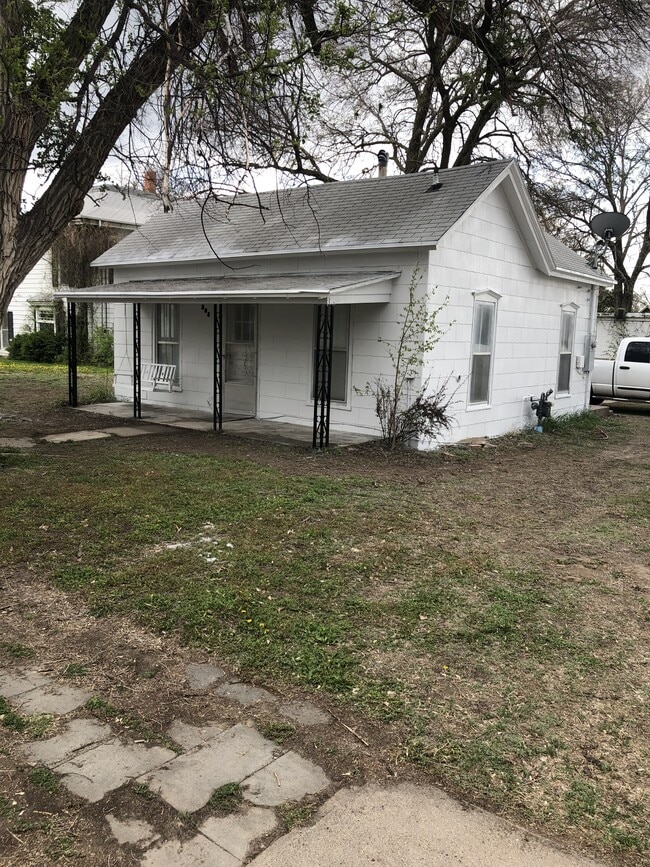 property at 208 E L St
