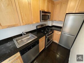 EAST 49 STREET in New York, NY - Building Photo - Building Photo