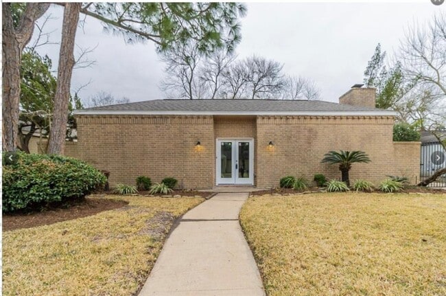 property at 14315 Piping Rock Ln
