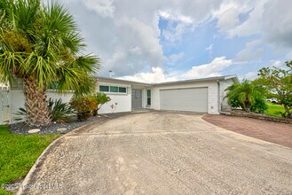 1065 Molaki Dr in Merritt Island, FL - Building Photo - Building Photo
