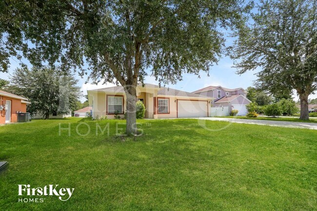 1424 Teal Dr in Poinciana, FL - Building Photo - Building Photo