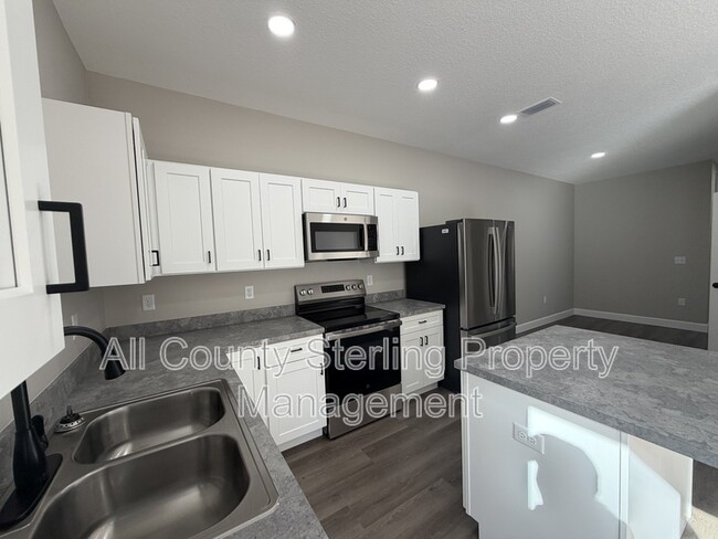 property at 1418 SE Magnolia Loop