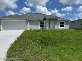 417 Harrington St SW in Palm Bay, FL - Building Photo