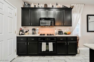 9772 Thistle Dew Ave in Las Vegas, NV - Building Photo - Building Photo