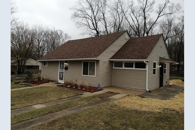 property at 3813 E 13th Ave