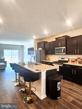 8760 Mimosa Ave in Clinton, MD - Foto de edificio - Building Photo