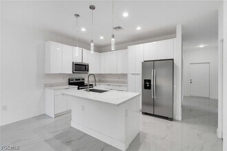 1037 Citrus Ave S in Lehigh Acres, FL - Building Photo - Building Photo