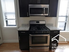 4036 N Ashland Ave, Unit E1 in Chicago, IL - Building Photo - Building Photo
