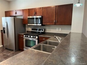 6465 S Potomac St in Englewood, CO - Foto de edificio - Building Photo