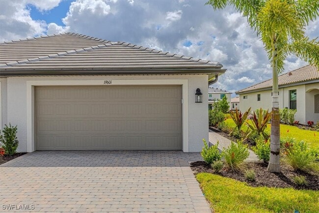 19601 Hinkley Dr in Estero, FL - Building Photo - Building Photo
