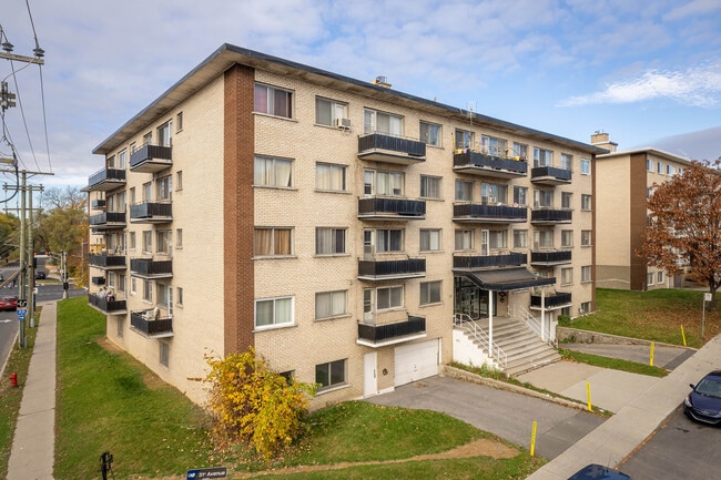 705 31E Av