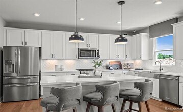 59579 Schuss Gully Dr in New Hudson, MI - Building Photo - Building Photo