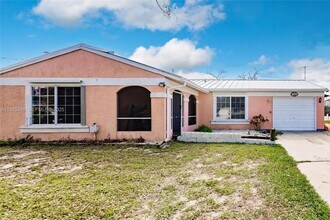 18406 Van Nuys Cir in Port Charlotte, FL - Building Photo - Building Photo